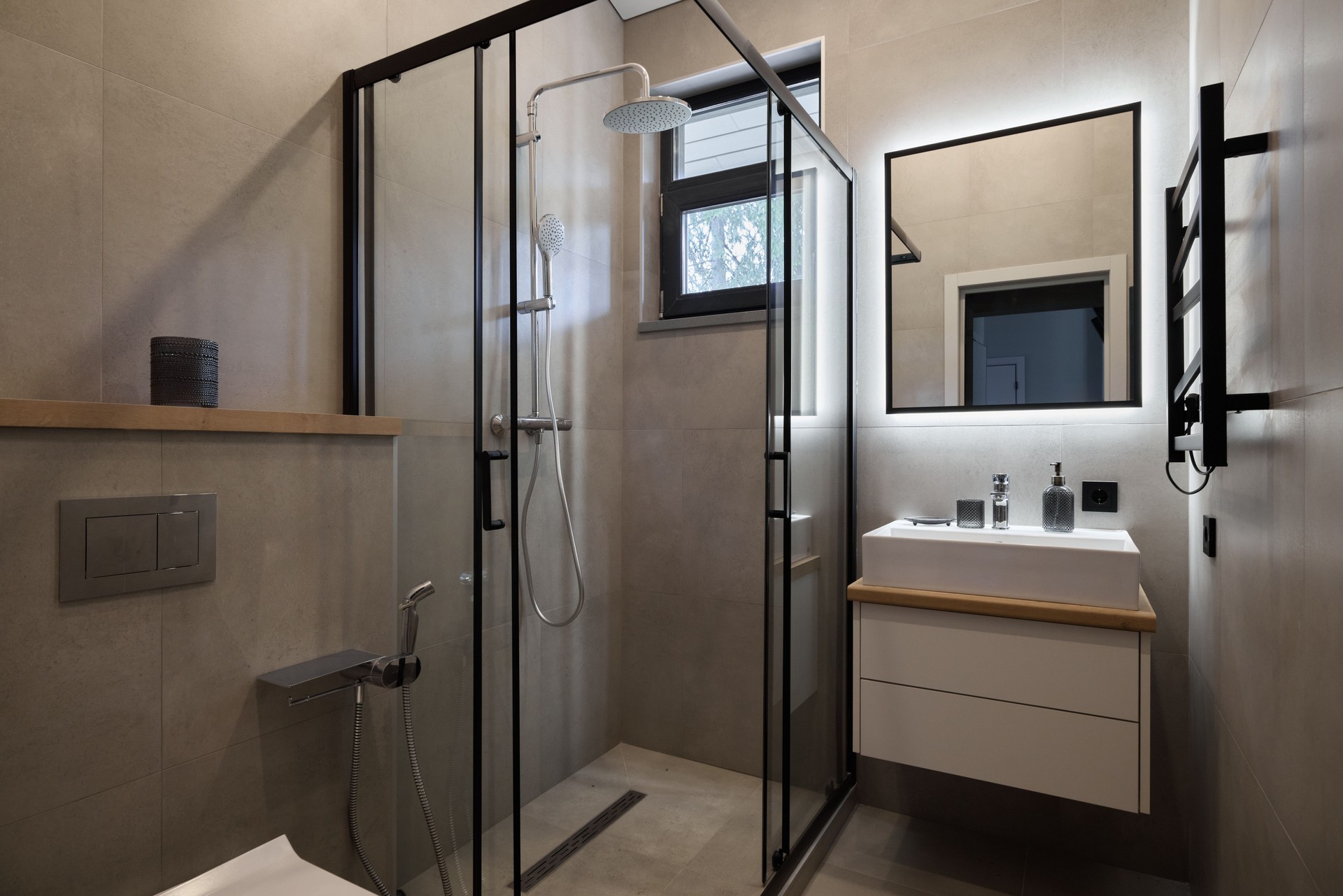 Experience a Modern Minimalist Bathroom featuring a beautifully designed Glass Shower